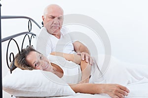 Man and woman on bed