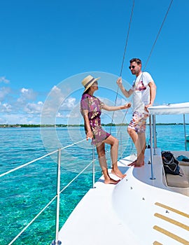 Man and Woman on a boat trip at a sailing boat in Mauritius