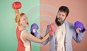 Man and woman boxing fight. Couple in love competing in boxing. Conflict concept. Family quarrel. Boxers fighting in