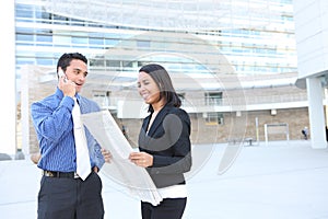 Man and Woman Business Team at Office Building