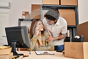 Man and woman business workers with sad expression working at office