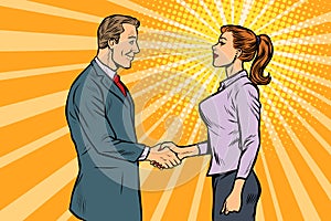 Man and woman businessman handshake