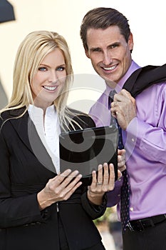 Man & Woman BusinessTeam Using Tablet Computer