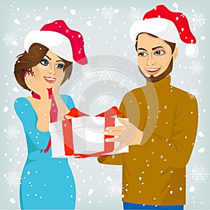 Man and woman with christmas present