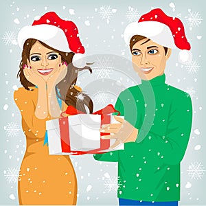 Man and woman with christmas present
