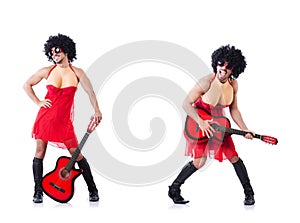 The man in woman clothing with guitar