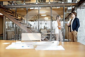 Man and woman during the coffee break in the office