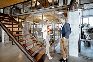 Man and woman during the coffee break in the office