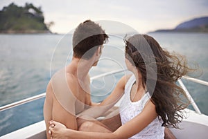 Man, woman and couple with back view on a boat in the ocean, vacation and travel to Italy for anniversary or honeymoon