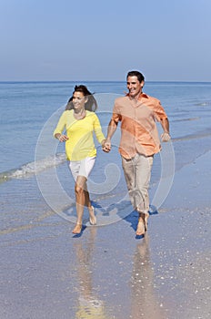 Man & Woman Couple Running on An Empty Beach