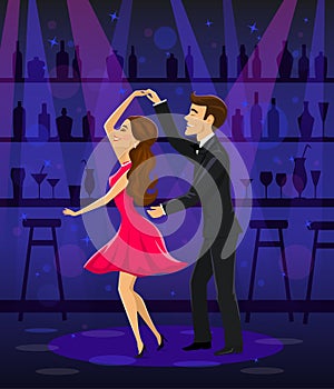 Man and woman dancing in disco bar night club