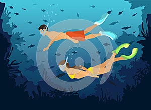 Man and Woman diving snorkeling exploring underwater world with fishes, corals, reefs photo