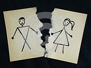 Man and woman drawing torn apart