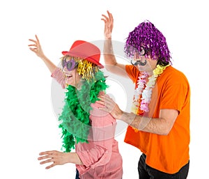 Man and Woman dressed in carnival costumes dancing a polonaise