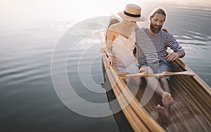 Man and woman enjoy canoeing