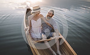 Man and woman enjoy canoeing