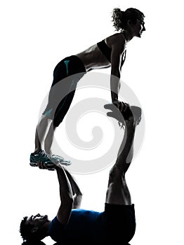 Man woman exercising acrobatic workout fitness silhouette