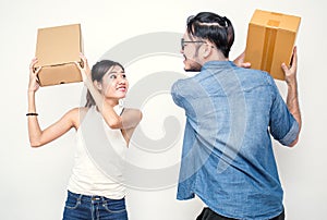 Man and woman fighting with boxes, online marketing packaging and delivery, SME concept