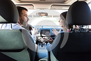 Man And Woman Fighting In Car