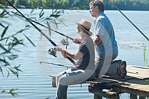 Man and woman with fishing rods