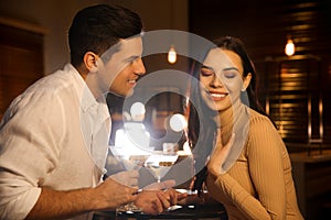 Man and woman flirting with each other in bar