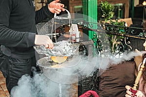 Man and Woman Grilling Food Together on a Barbecue.