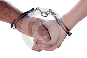 Man and Woman hands with handcuffs