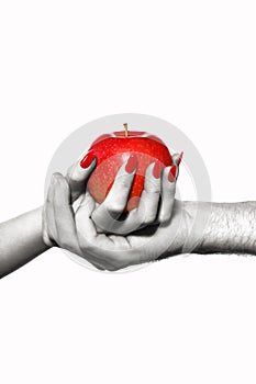 Man and woman hands holding forbidden fruit, selective coloring