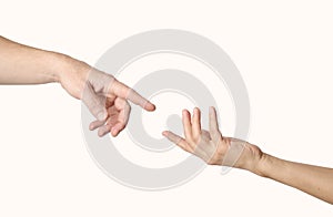 Man and woman hands reaching to each other