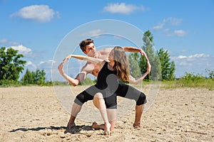 Man and woman hands showing infinity symbol