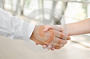 Man and woman handshake