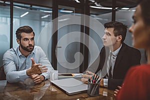 Man and woman having an argument in the lawyers office