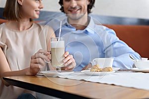 Man and woman having lunch at cafe