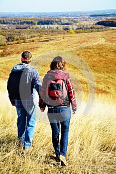 Man and woman are hiking