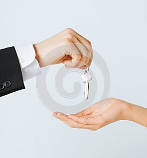 Man and woman with house keys