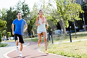 A man and a woman jogging