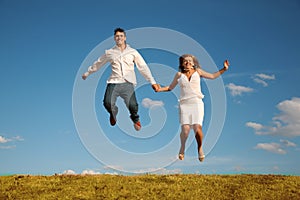 Man and woman jumping