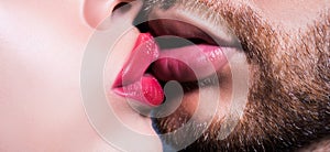 Man with woman kisses. Close up of couple lips wants to kiss. photo