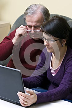 Man and woman with laptop