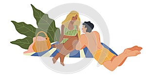 Man and woman laying on beach, picnic of couple