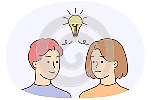 Man and woman with lightbulb generate idea