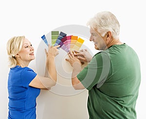 Man and woman looking at swatches.