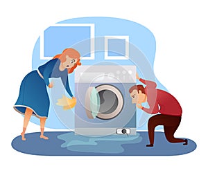 Man and woman looking at washing machine leakage