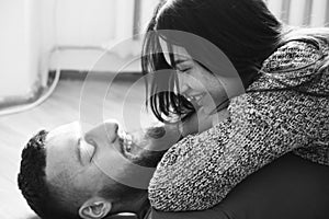 Man and woman lying on the floor