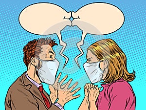 Man and woman in medical masks kiss