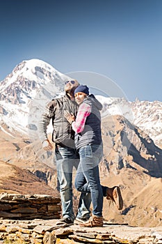 Man and woman in the mountains