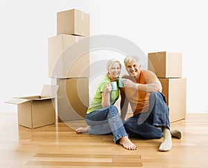 Man and woman with moving boxes.