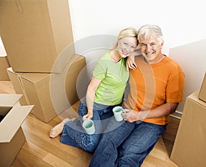Man and woman with moving boxes.