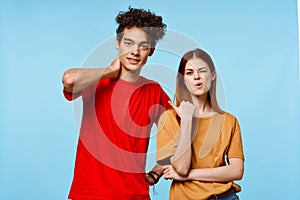 man and woman in multicolored t-shirts communication emotions modern style