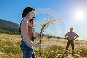 Man and woman in nature in the sun, the relationship between loved ones man and woman in nature in the sun, the relationship